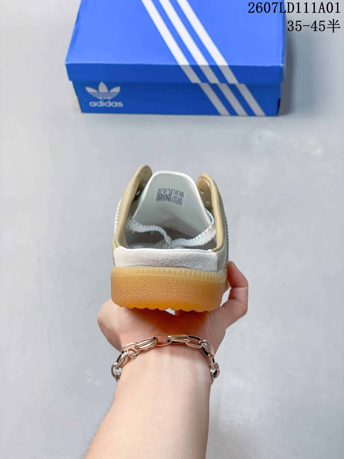 Rear view of a sneaker with a gum-colored sole