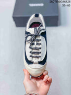 Top view showing the rounded toe, contrasting lace panels and patterned laces.