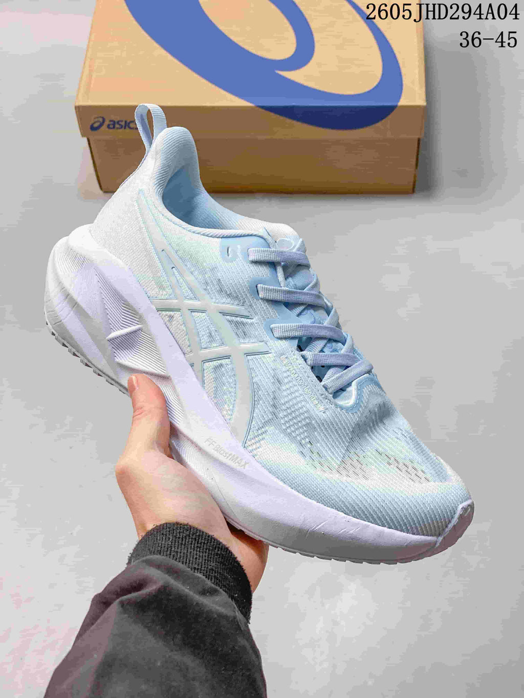 Pale blue and white ASICS NOVABLAST 5 LE running shoe