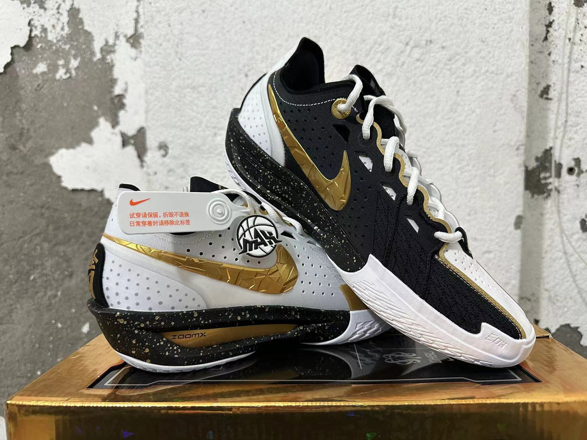 Nike GT Cut 3 shoes shown from side and top angles