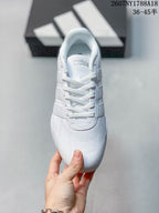 Top view showing the white laces, tongue branding and stitched toe detailing.