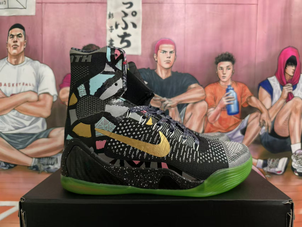 Side view showing gold Nike logo, multicolor graphic panels, and green outsole