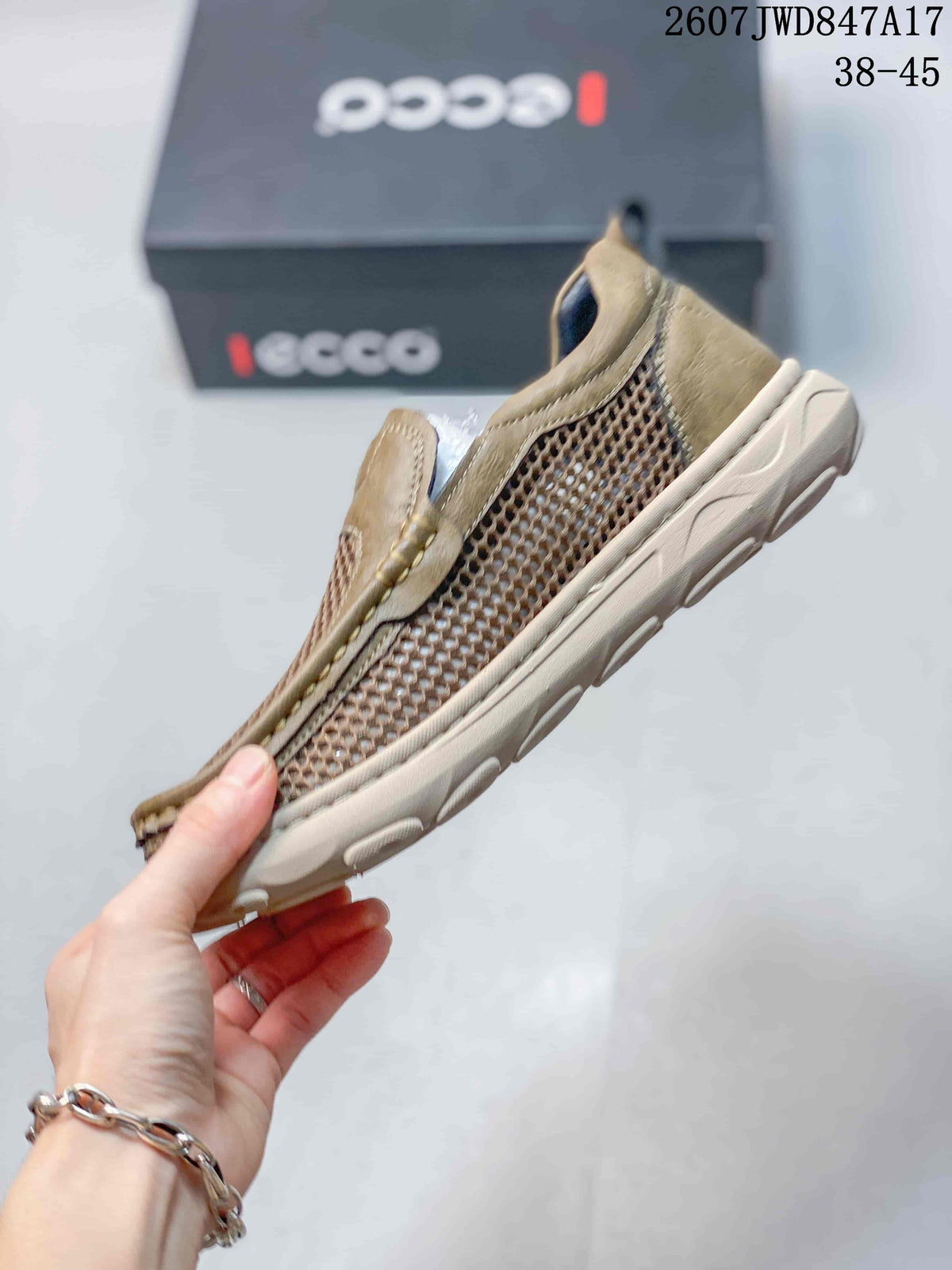 Side view of the olive-tan sneaker showing the mesh side panel, stitched overlays, and textured outsole.