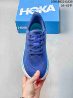 Top view of a blue running shoe showing its laces and upper