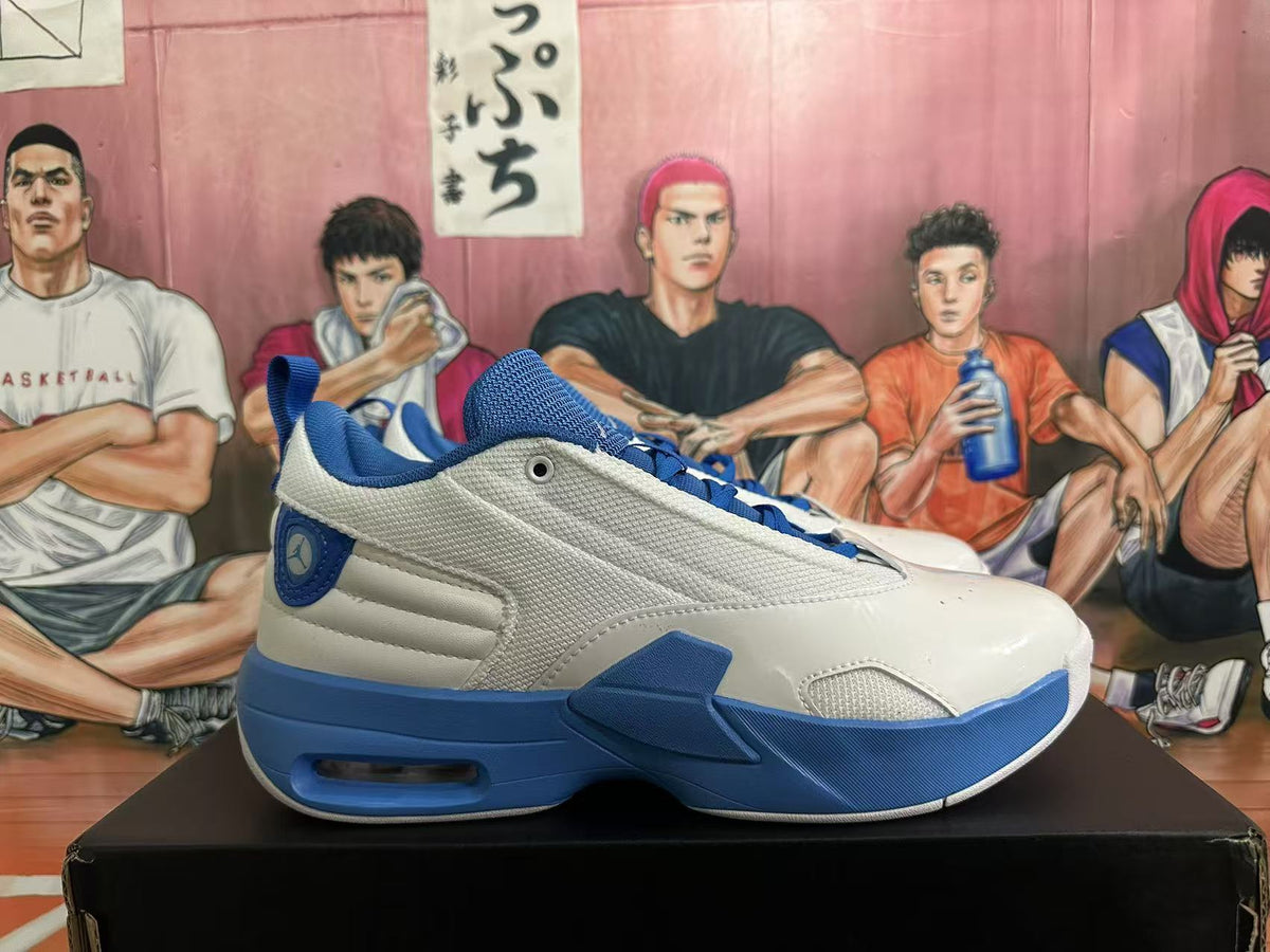 Side view of a white and blue Jordan sneaker showing layered panels, blue outsole sections, and a heel cushioning window.