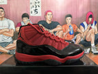 Side view of a black and red high-top sneaker with red textile panels, glossy black overlays, and a textured outsole.