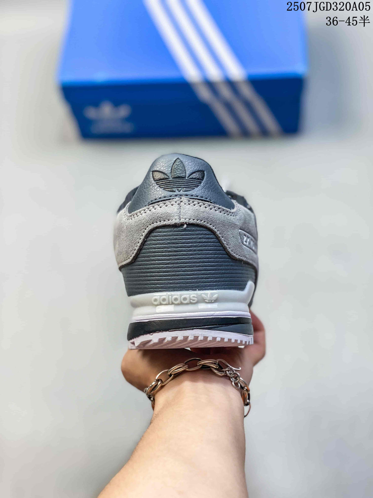 Rear view of a grey adidas ZX 750 sneaker showing the heel panel.