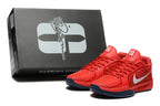 Red Nike Sabrina basketball shoes beside a Sabrina Ionescu shoe box.