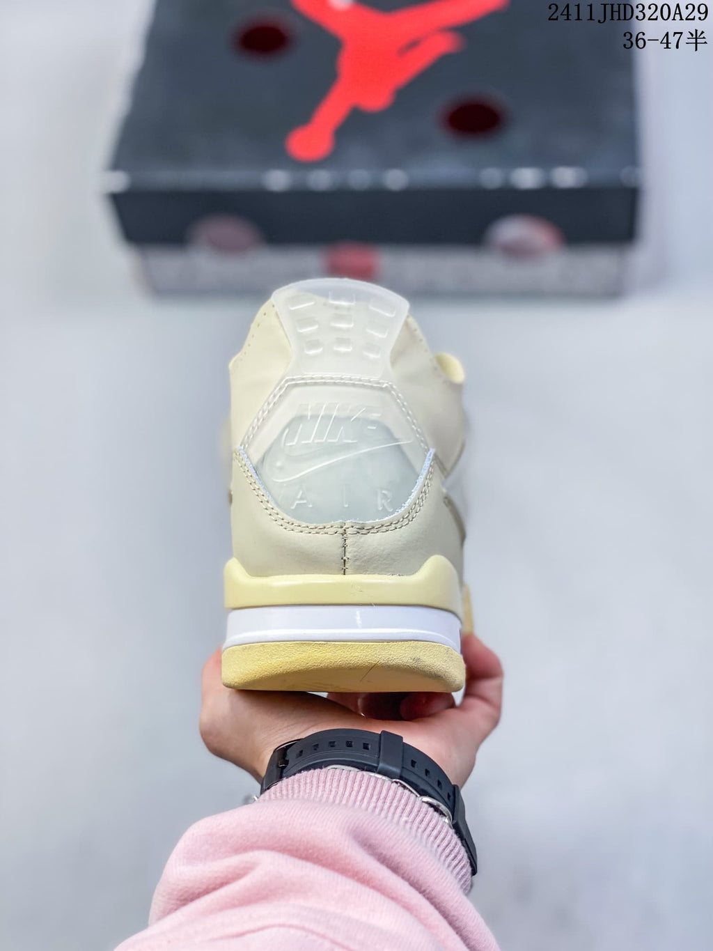 Rear view showing the heel tab, heel branding, and layered midsole