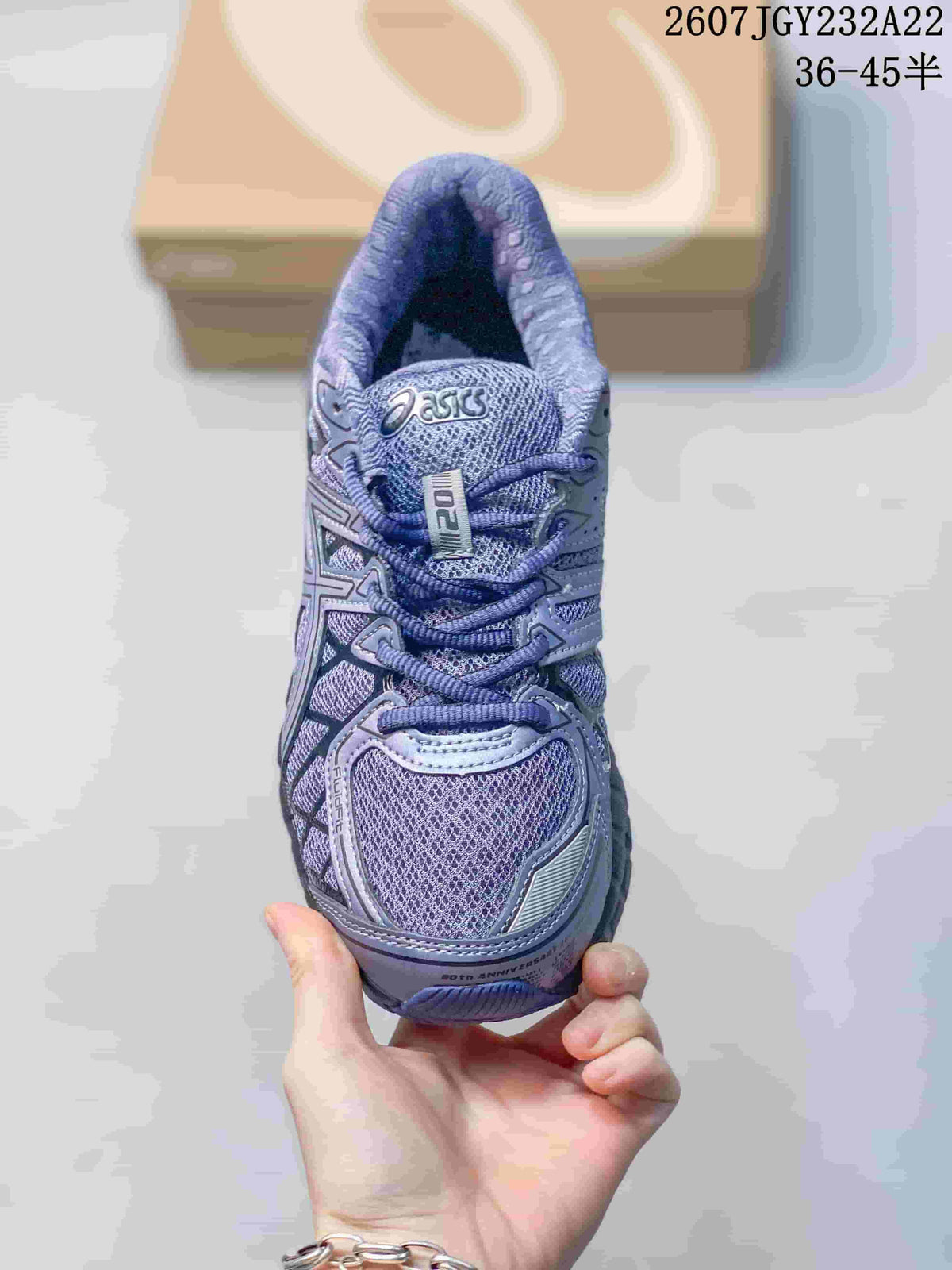 Top view showing the mesh toe area, laces, tongue, and ASICS branding.