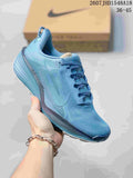 Blue Nike ReactX Pegasus ACG Trail 6 sneaker shown from the side with a matching shoebox behind it.