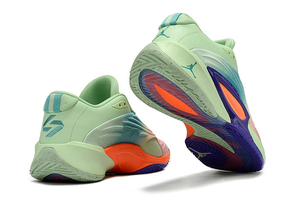 Rear and outsole views of mint green Jordan Luka 3 shoes with orange and purple accents