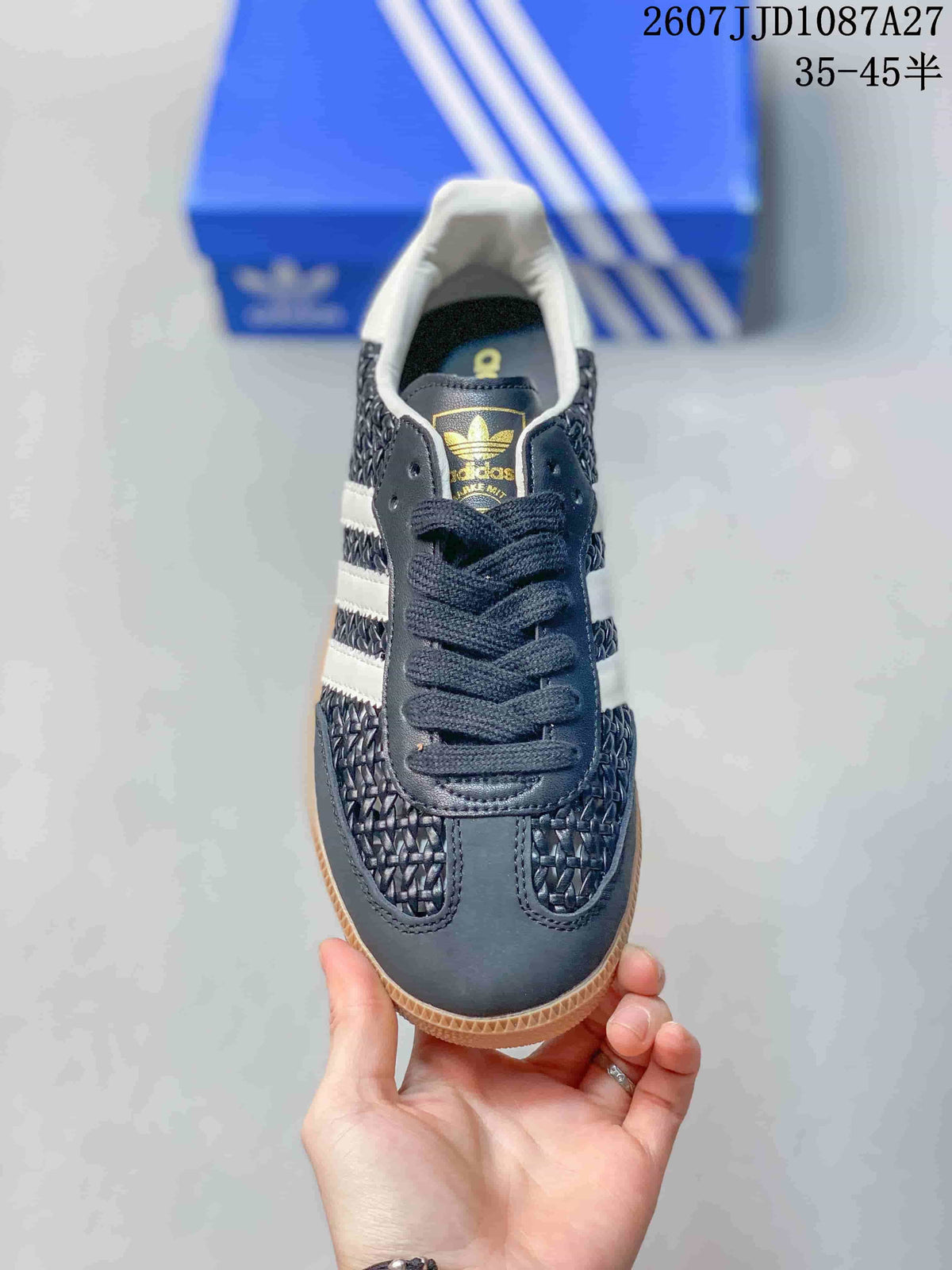 Top view of the sneaker showing dark laces, white collar padding, woven-texture panels, and adidas Originals tongue branding.