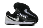 Black and white Nike Ja 2 basketball shoes with a speckled midsole, side and outsole views