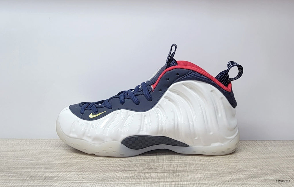 Opposite side profile of the white Nike Air Foamposite One sneaker.