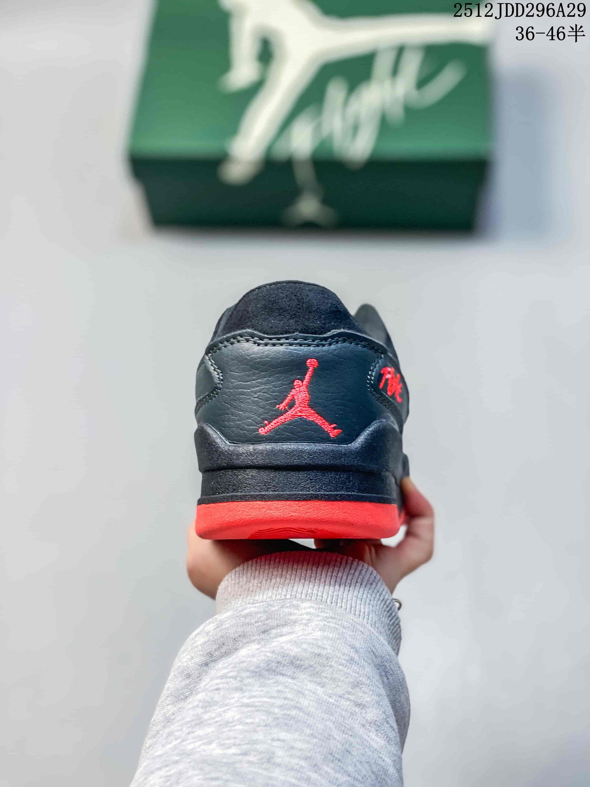 Rear view showing the black heel panel, red Jordan logo and red outsole edge.