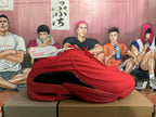 Side view of a red Nike basketball shoe with black midsole accents