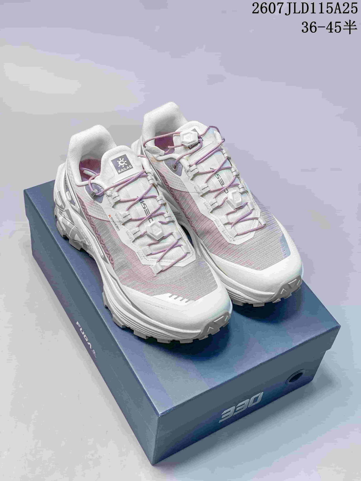 Pair of white and lilac KAILAS FUGA EX330 trail running shoes displayed on a product box; style code 2607JLD115A25 and size range 36–45 are visible.