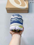Rear view showing the layered heel and outsole of a blue and gray sneaker