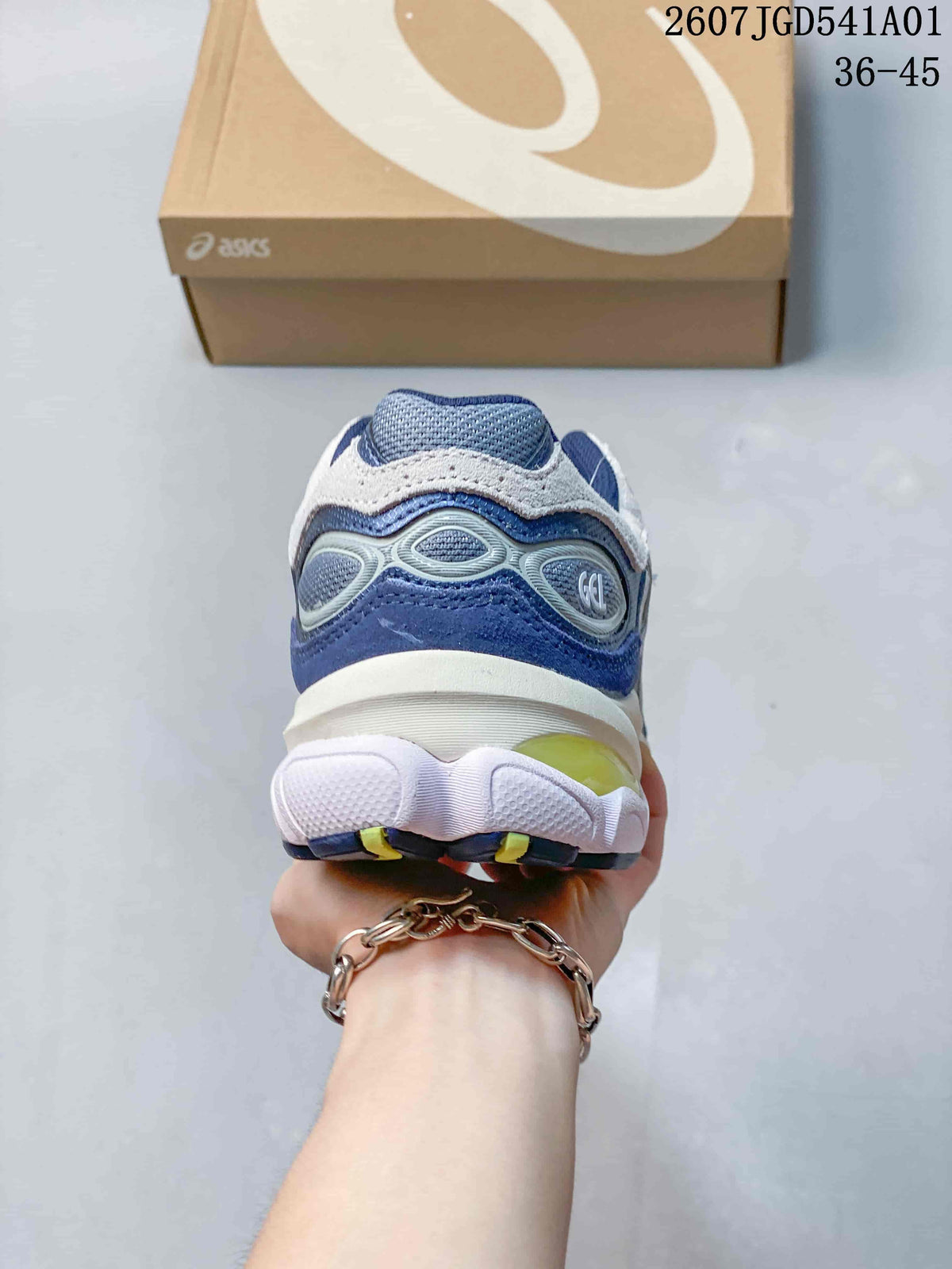 Rear view showing the layered heel and outsole of a blue and gray sneaker