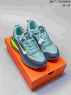 Pair of gray Nike running sneakers with neon yellow accents displayed on an orange shoebox; image text shows code 2607JGD186A06 and sizes 40–45.