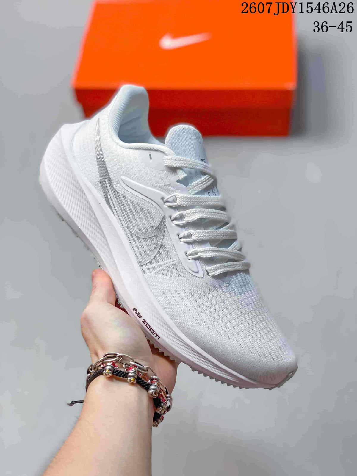 Light gray and white Nike Air Zoom Pegasus 39 sneaker shown from a front-side angle.