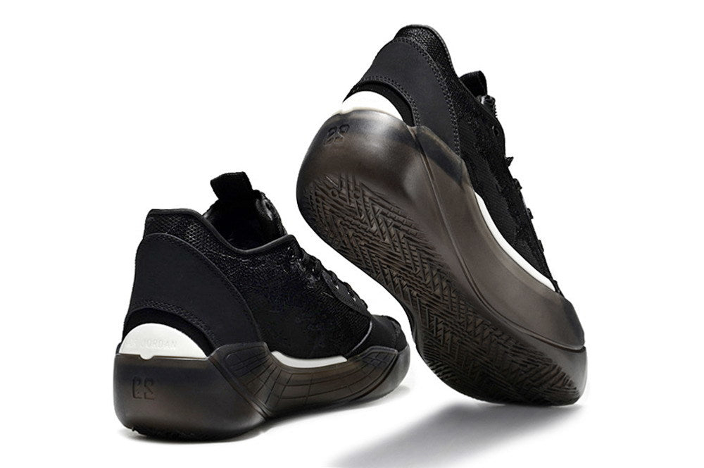 All-black Jordan Luka 39 shoes shown from the heel and outsole