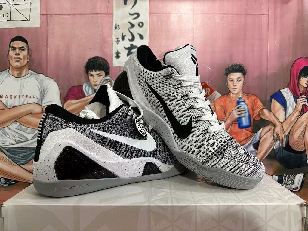 Angled view of the pair showing the patterned uppers, contrasting side branding, white laces and grey outsoles.