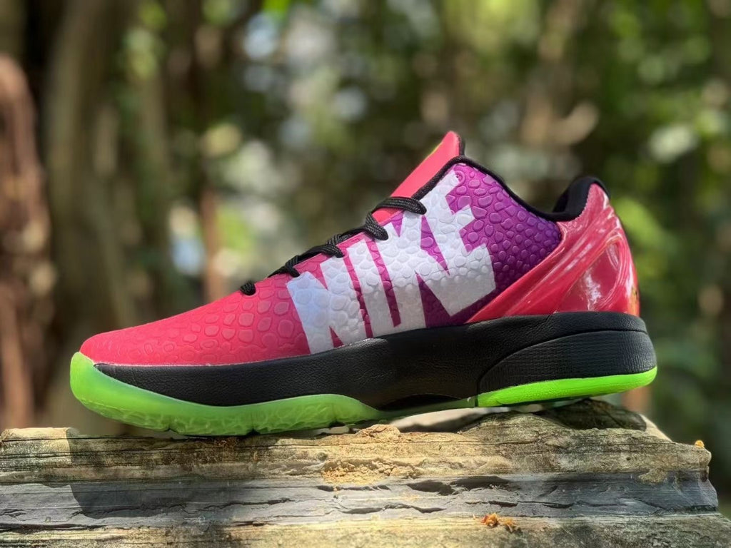 Opposite side view showing the large white graphic on the pink and purple shoe