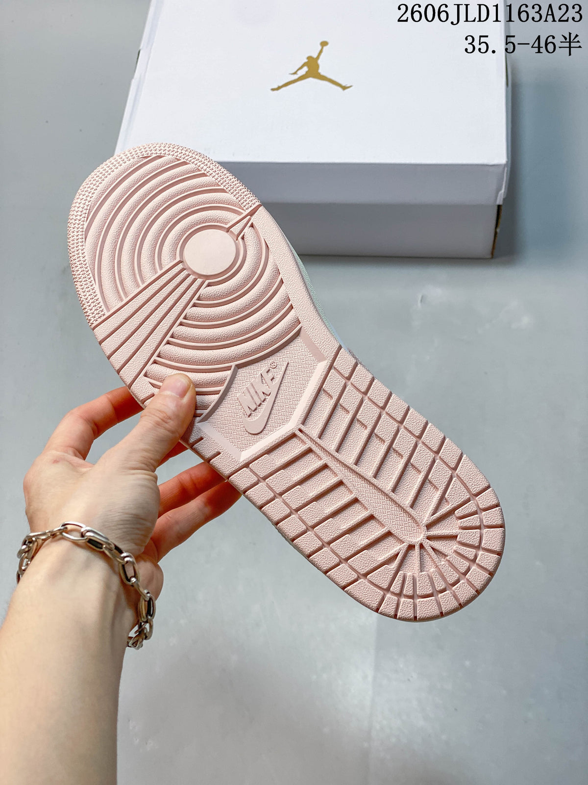 Pink patterned outsole of a low-top sneaker