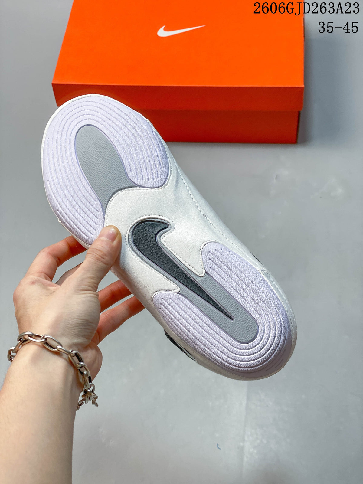 Close-up of the patterned outsole on a Nike wrestling shoe