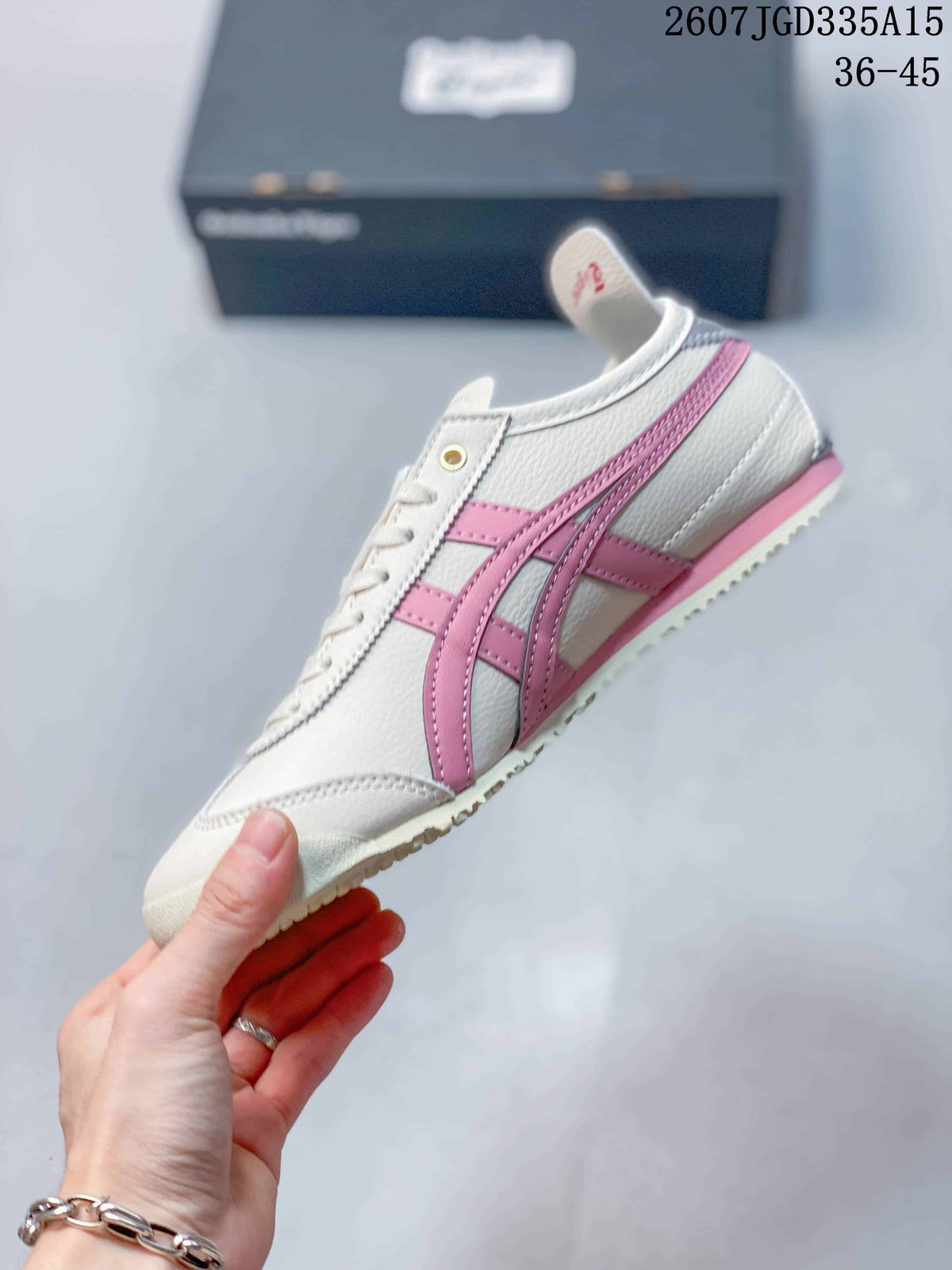 Side profile highlighting the white upper, pink layered stripes, and low-profile sole.