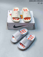 Nike Mind 001 slides shown from several angles beside their box