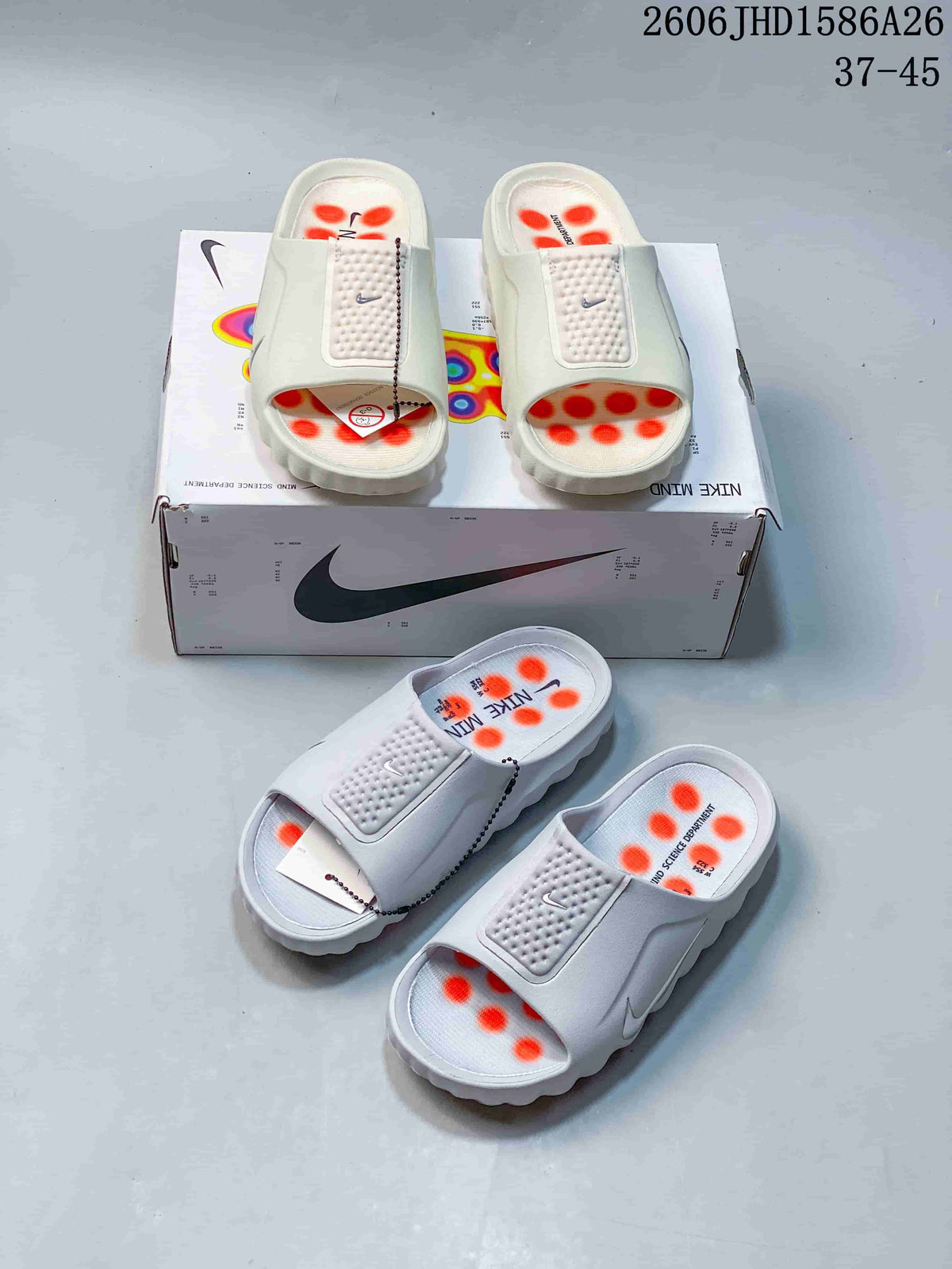 Nike Mind 001 slides shown from several angles beside their box