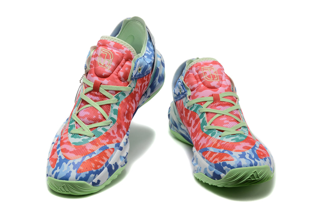 Pair of multicolor camouflage Adidas basketball sneakers viewed from the front