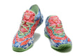 Pair of multicolor camouflage Adidas basketball sneakers viewed from the front