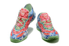 Pair of multicolor camouflage Adidas basketball sneakers viewed from the front