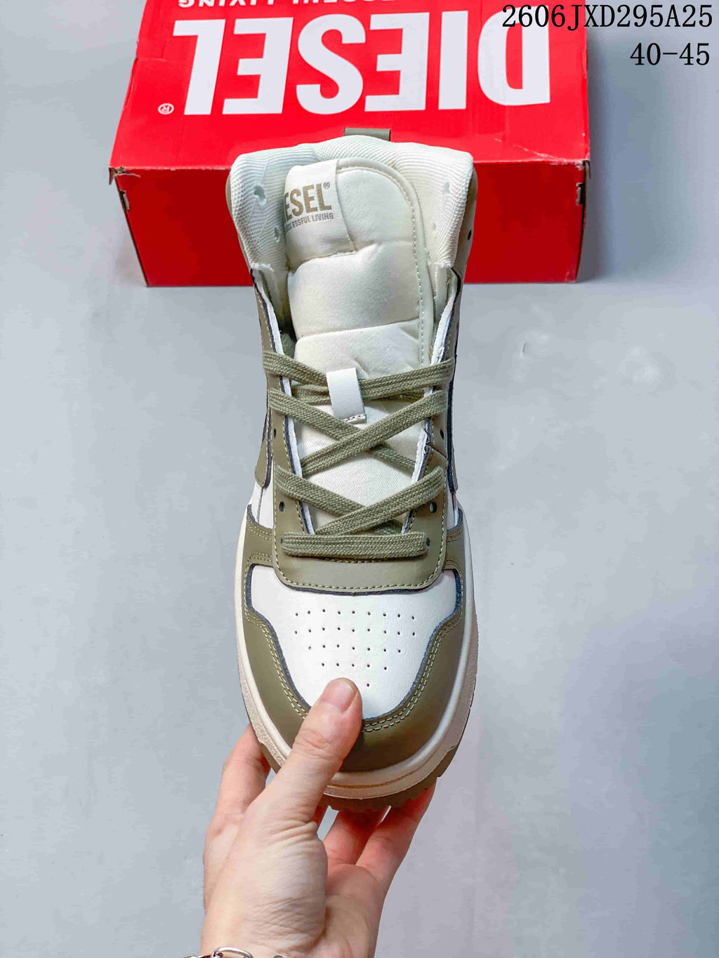 Front view showing the rounded perforated toe and lace-up closure