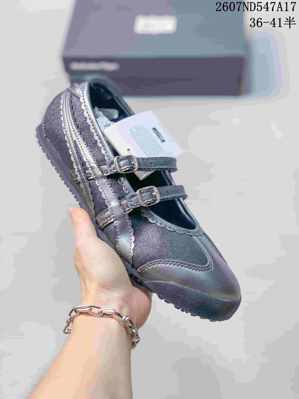 Dark gray Mary Jane sneaker with tonal side stripes and two silver-tone buckles.