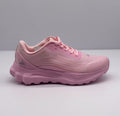 Side profile of pink Alo low-top sneakers showing the textured upper, laces, padded collar, and sculpted sole.