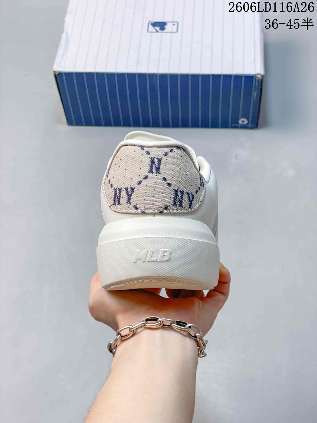 Rear view of the sneaker showing MLB branding on the heel and a patterned NY heel panel.