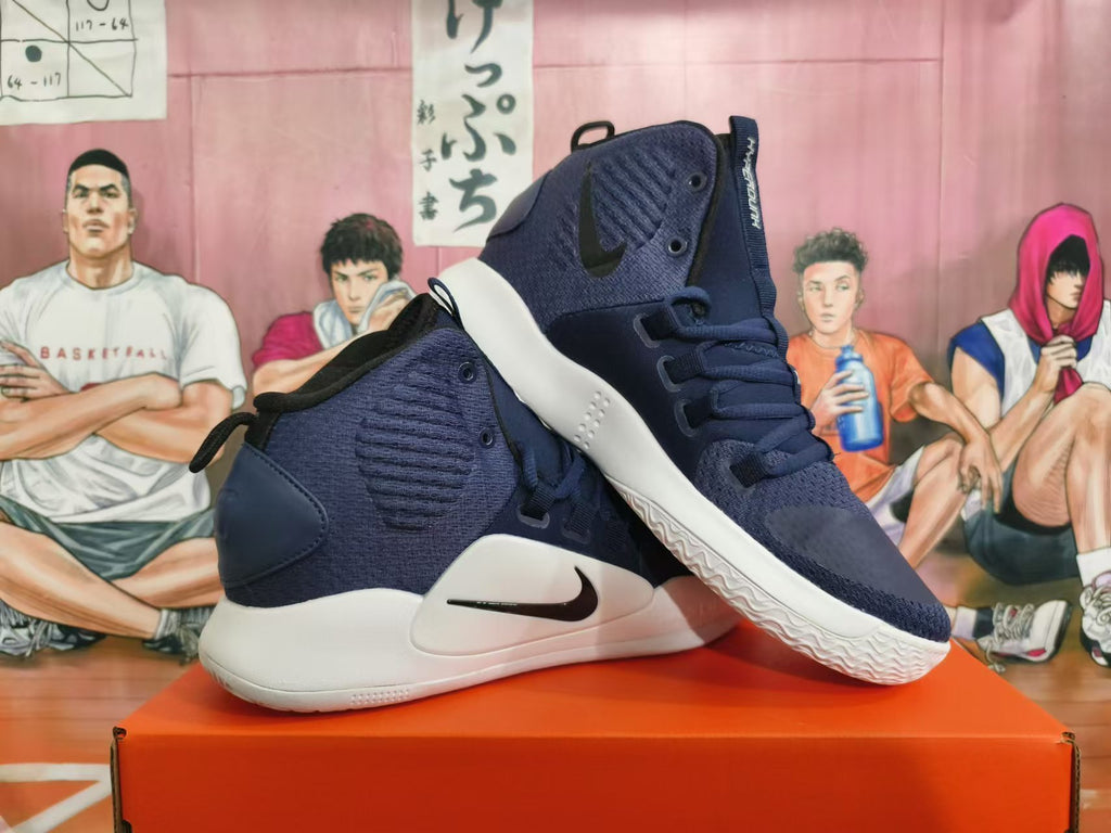 Pair of navy Nike Hyperdunk basketball shoes with black Swooshes and white soles