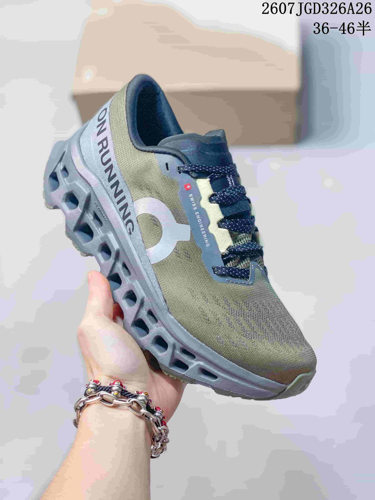 Angled side view of the olive and gray sneaker showing the On side logo, running graphics, laces, and sculpted sole.