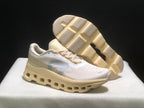Angled view showing the shoe upper, open geometric midsole sections, and textured outsole.