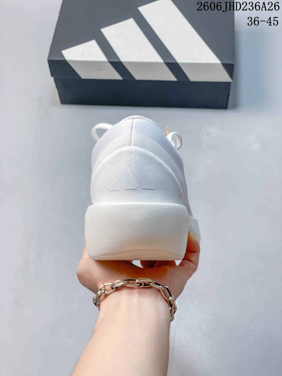 Rear view of a white ZenBoost shoe showing the heel logo and thick white sole.