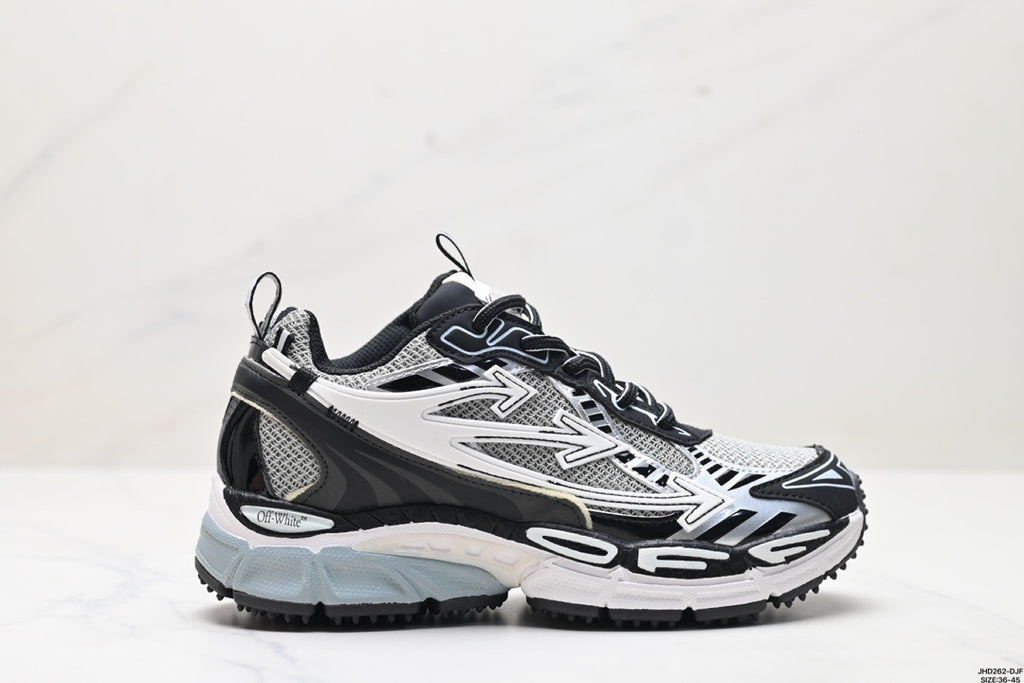Side profile of the sneaker showing the black, white, and grey layered construction.
