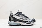 Side profile of the sneaker showing the black, white, and grey layered construction.