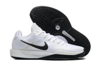White basketball shoe shown with its black patterned outsole