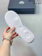 Close-up of the white textured rubber outsole with circular traction patterns and a visible embossed Nike Air mark.
