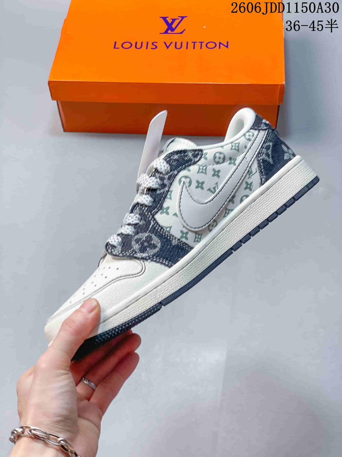 Side view of the low-top sneaker with a white Swoosh and pale patterned panel